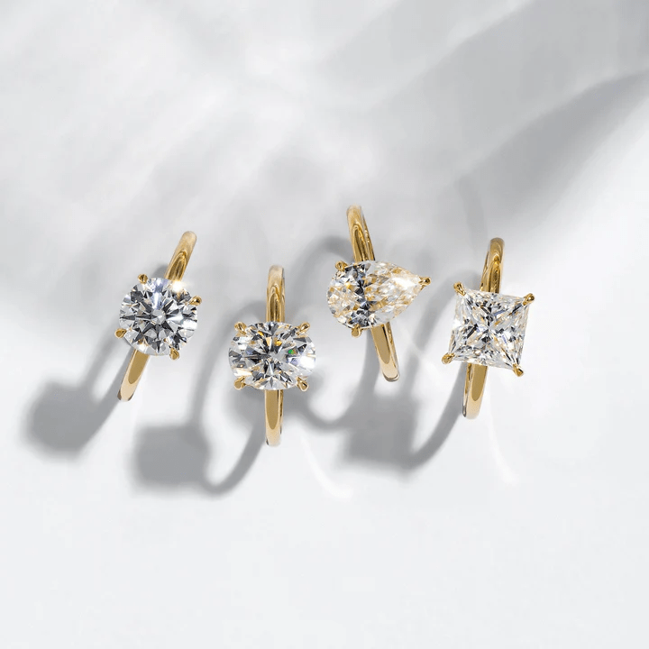 Four Madera Bands engagement rings with unique shapes and cuts