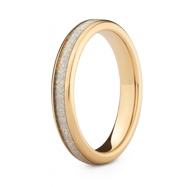Gold women's ring with white opal on a white background
