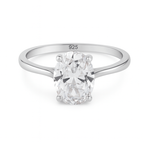 Silver solitaire engagement ring with a large oval diamond on a white background