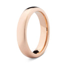 Rose gold ring on a white background