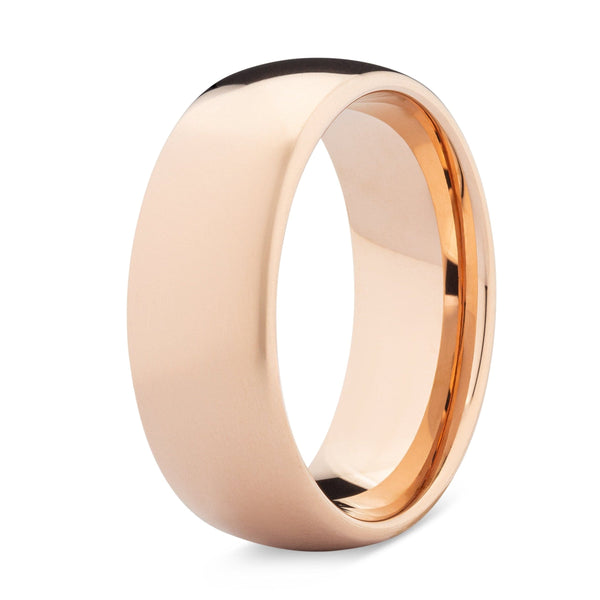 Rose gold ring on a white background