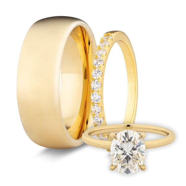 Gold his and hers wedding band set with oval diamond women's band solitaire diamond on a white background