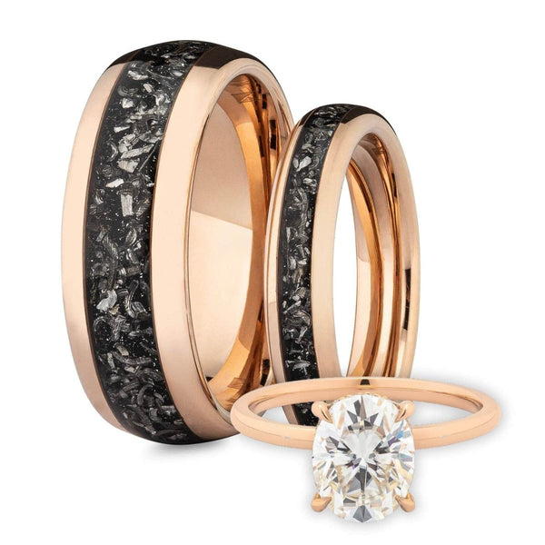 Two rose gold his & hers meteorite wedding bands with oval solitaire diamond ring on a white background