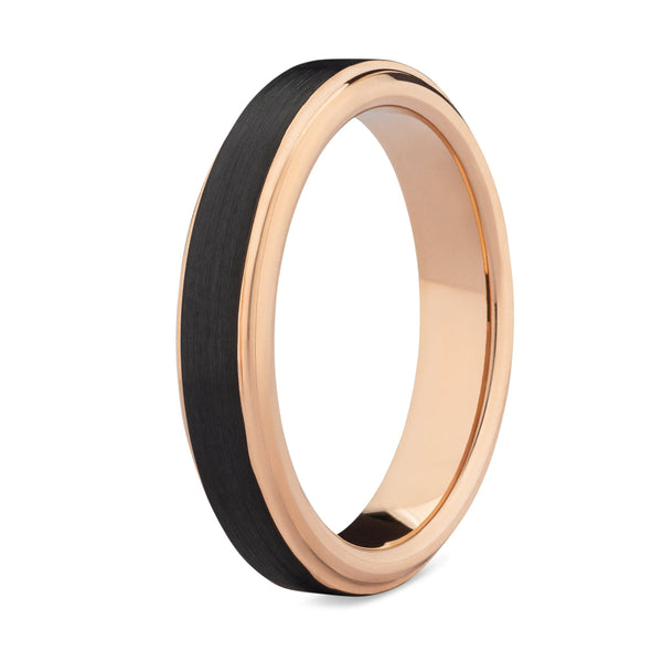 Rose gold ring with black tungsten inlay on a white background