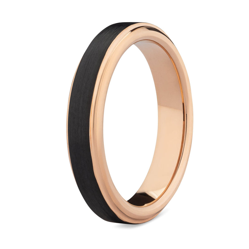 Rose gold ring with black tungsten inlay on a white background