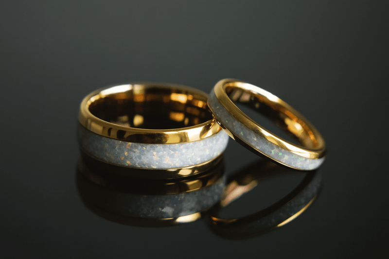 couples’ opal rings with gold bands