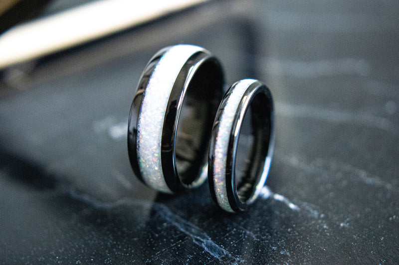 The Beast & Beauty 2.0 matching opal wedding bands standing upright