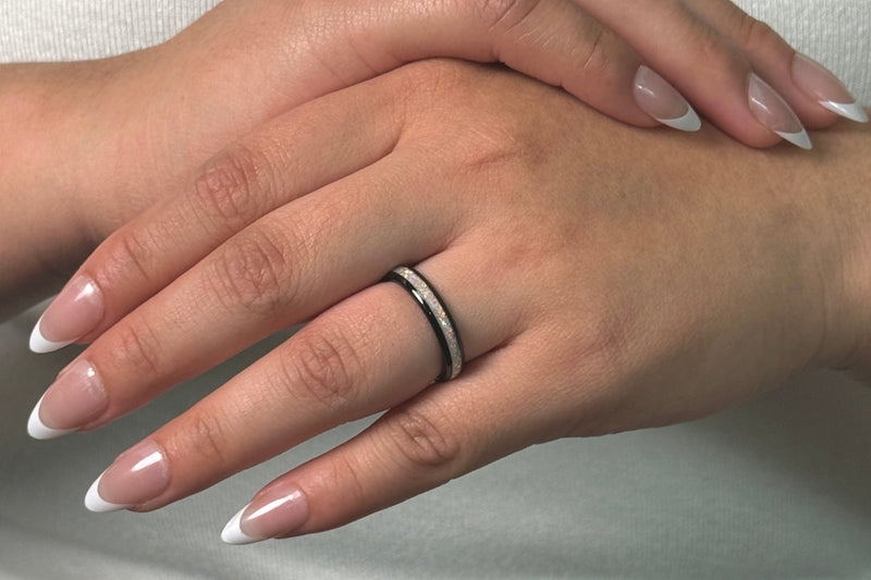 opal ring with black wedding band for her